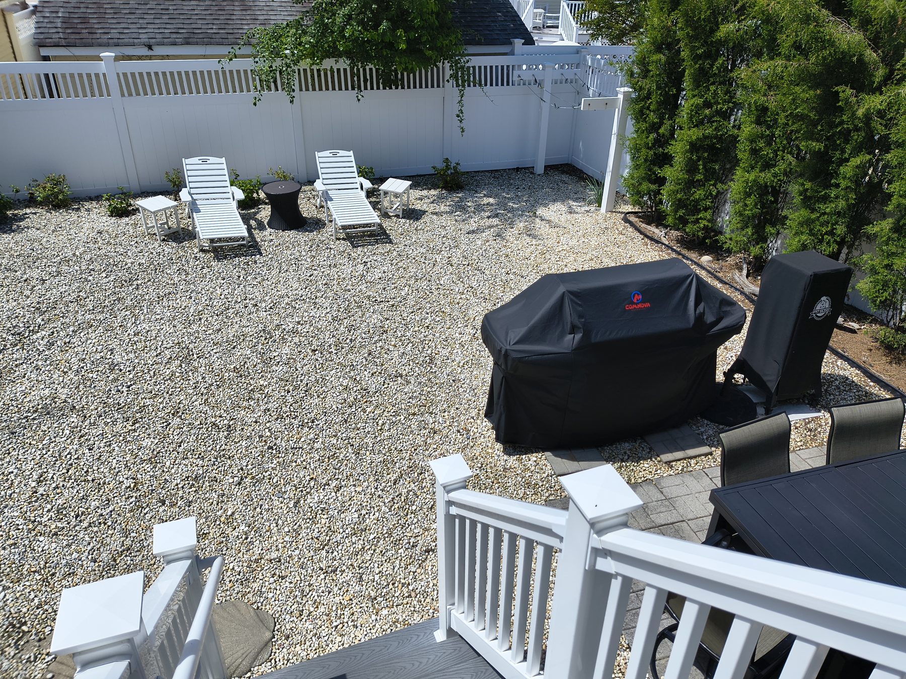 Chaise loungers and grill area
